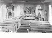 Interiörbild av Stamnareds kyrka från läktaren mot koret. Altare, altaruppsats, altarring, predikstol, golvur, bänkar.