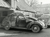 Krockskadad personbil hos Hammarqvists bilverkstad, som låg utmed Borgmästaregatan i kv Nålmakaren.