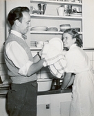 Toffelhjälte i köket, 1950-tal