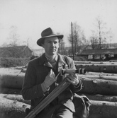 Fotograf ute på jobb, 1950-tal