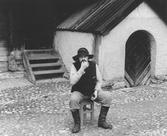 Skådespelare lägger in en snus, 1960-tal