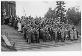 Mötesdeltagare på bibliotekariemöte framför kameran, 1940-tal