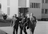 Tre män i kostym, 1950-tal