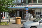 Butik och parkeringsautomat på Stortorget 15, 2016-06-22