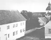 Storgatan sedd söderut från byggnad på tomt 63 (numera Brogatan).  Bild nr 1 Två 