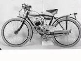 Motorcykel med pedaler.
