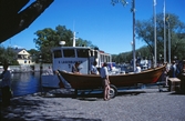 Isättning av kyrk roddbåt, båtens dag 1997