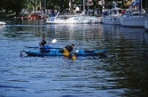 Vy över båtar och kanoter i gästhamnen, båtens dag 1999