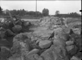 Västerås, Hammarby.
Sankta Gertruds kapellruin under arkeologisk undersökning 1934.
Västra kortväggen från sydväst.
