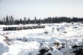 Snön täcker byggområdet av Brickebacken, 1968