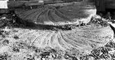 Kvarnhjul använda som trappa i Tjusebotorp i Hovata, 1982