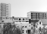 Rivningshus och nybyggnation av hyreshus vid Drottninggatan, 1960-1961