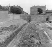 Grundläggning i hus B vid nybyggnation i kvarteret Tunnbindaren, 1959