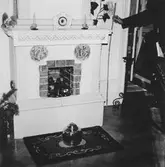 Kakelugn i rum på Fabriksgatan 34, 1970-tal