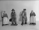 Västgötagubbar i trä