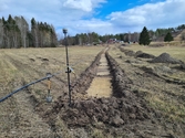 Vy över schaktet OS204, mot sydöst. Från arkeologisk undersökning i form av schaktningsövervakning i Hede, Hälsingtuna socken, Hudiksvalls kommun.