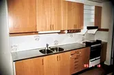 Kök med diskbänk och spis i Södermalm, 1985-11-18