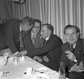 Estniska klubbens årsfest i Kristinagården, fyra män vid ett bord