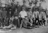 Grupp med arbetare med förman i Hammar, ca 1921