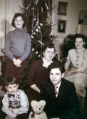 Familj vid julgran, 1950-tal
