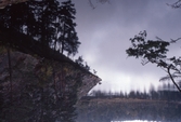Spegelbild i Trollkyrkosjön i Tivedens Nationalpark, 1980