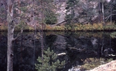 Trollkyrkosjön med spegelbild i Tivedens Nationalpark, 1980