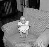Bäbis i fotölj