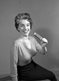 Reklambild, kvinna med glasspinne