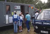 Besökare vid turistinformationen på Ånnaboda camping, 1980-tal