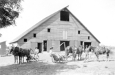 Män på slåttermaskiner i Charnote Kansas, USA, 1899