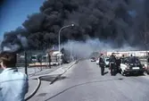 Polis närvarar vid branden vid Gotthards, april 1982