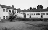 Skolgård vid Axbergshammars skola i Dyltabruk, 1974