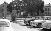 Bilar på rivningstomt på Ekersgatan, 1974