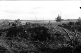 Romfartuna sn arkeologisk undersökning av sju fornlämningar på gravfält söder om Äs utförd av Sven Drakenberg 1948

Anläggning 1, jordtäckt röse.