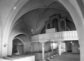 Interiör av Björksta kyrka före renoveringen.
Orgeln och södra ingången.
Västerås.