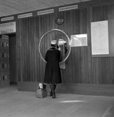 Telefonautomat på busstationen, efter 1963