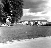 Picknik på gräsmattan i Baronbackarna, 1960-tal