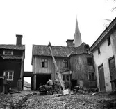 Nedplockning av taket på Handelsboden