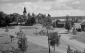 By kyrka med utsikt över Bysjön. Läs mer om By kyrka i boken: Dalarnas kyrkor i ord och bild.