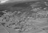 Flygfoto över Bergkarlås, Mora kommun, år 1950.