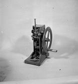 Maskin tillverkad vid Lysekils Mekaniska verkstad.