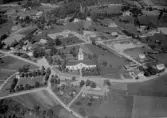 Flygfoto över Bjursås kyrka 1956.