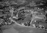 Flygfoto över Bjursås kyrka 1956.