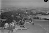 Flygfoto över Buskåker, St. Tuna.