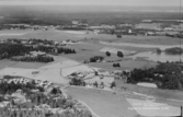 Flygfoto över By Kyrkby, Dalarna.