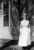 Kvinna i sjuksköterskedräkt i Brockton i USA, 1924