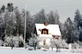 Vinter över hus i Yxtabacken i Hovsta, 1970-tal