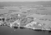 Flygfoto över Grangärde. Grangärde kyrka och bebyggelse år 1950.