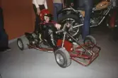 Pojke prövar en gokart i Täby, 1970-tal
