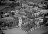 Flygfoto över Orsa kyrka år 1962.